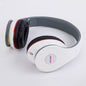 Casque de gaming filaire : basses puissantes, commande filaire intégrée, universel pour ordinateur et téléphone portable.