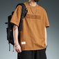 T-shirt à manches longues pour homme de style haut de gamme américain avec broderie lettrage.