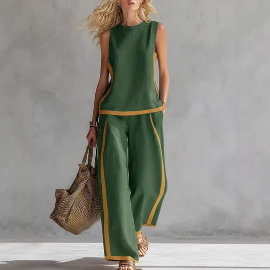 Ensemble décontracté : haut ample sans manches à col rond et pantalon large fluide à taille haute.