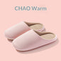 Chaussons d'intérieur en peluche chaude pour l'hiver.