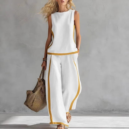 Ensemble décontracté : haut ample sans manches à col rond et pantalon large fluide à taille haute.