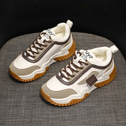 Nouvelles chaussures de sport pour femme avec lacets de couleur contrastée.